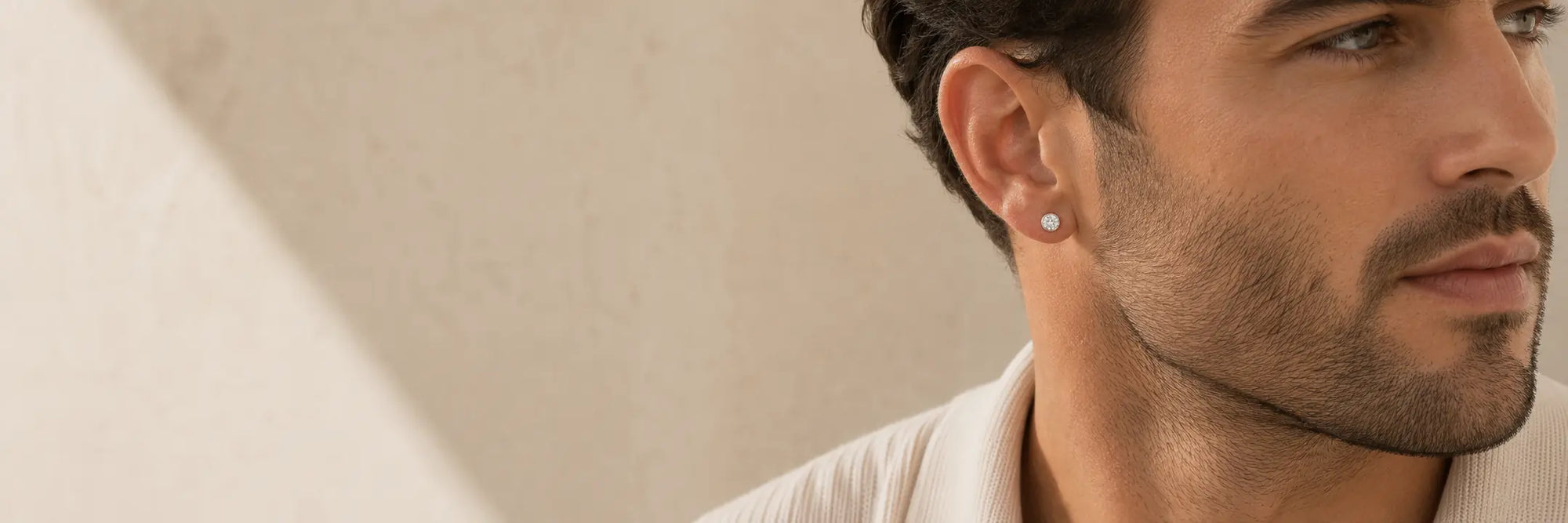 Man wearing a diamond stud earring