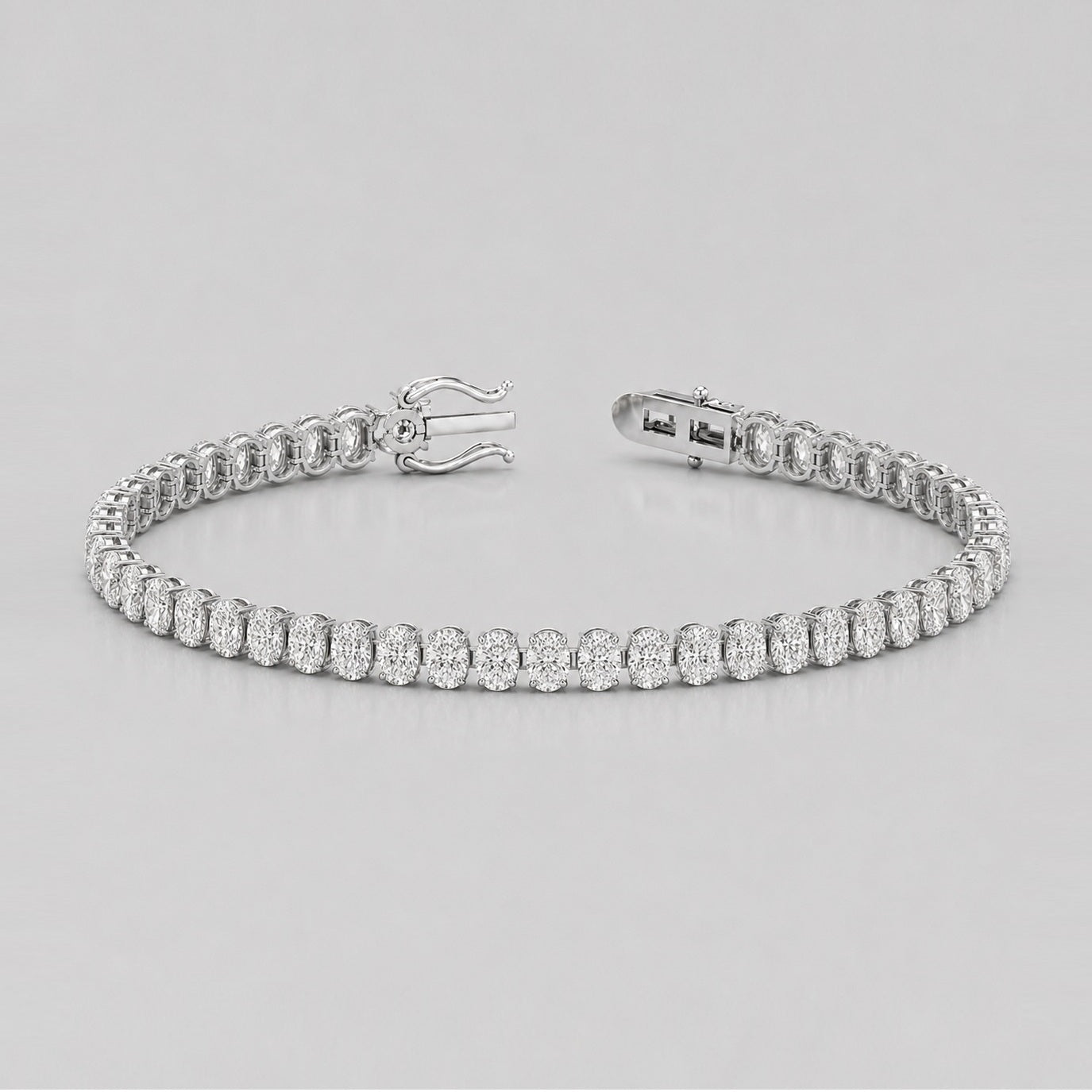 Vertical Oval Diamond Vertical Tennis Bracelet in Gold & Platinum (8Ct-30Ct)