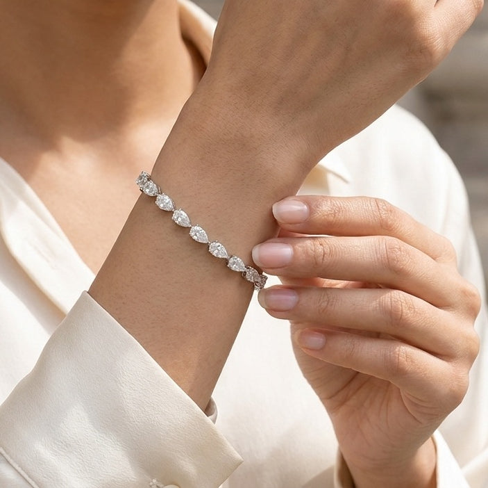 GIA Certified 8.20CT E/VS1-2 Pear Diamond Claw Set Tennis Bracelet in Platinum (950)