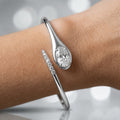 1.00ct Oval Diamond Tennis Bangle - 9k White Gold