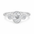 IGI Certified Oval Bezel Lab Grown Diamond Three Stone Engagement Ring