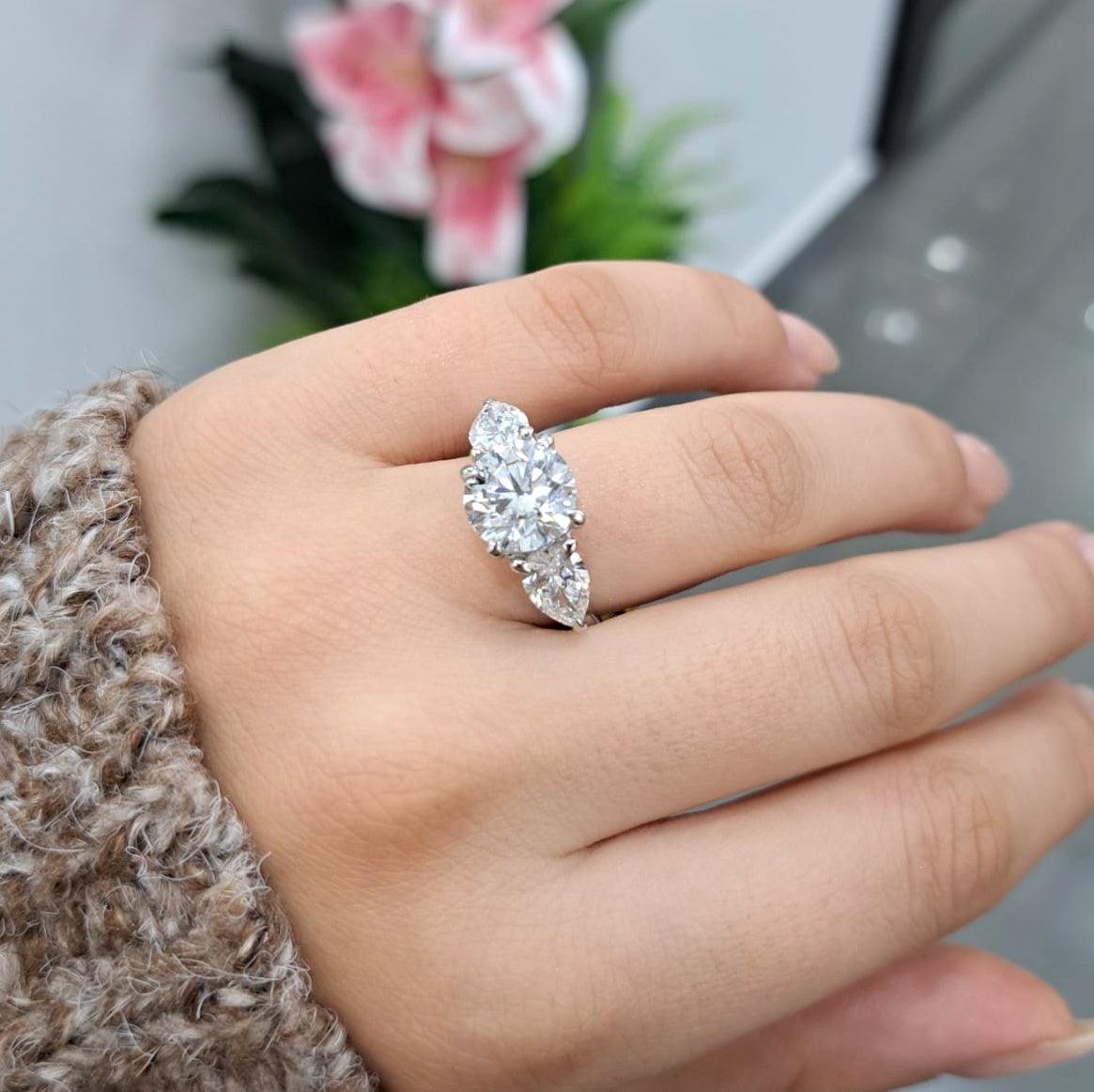 IGI Certified F/VS 3.00 Ct Round With Side Pear Diamond Trilogy Engagement Ring - Platinum