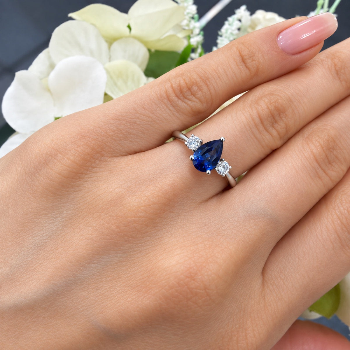 1.50Ct Blue Pear Sapphire & Side Round Diamond Three Stone Ring in 950 Platinum