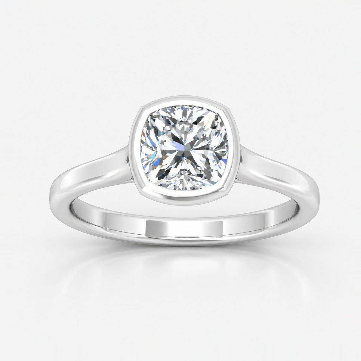 IGI Certified The Flow Cushion Diamond Solitaire Bezel Set Engagement Ring in Gold & Platinum