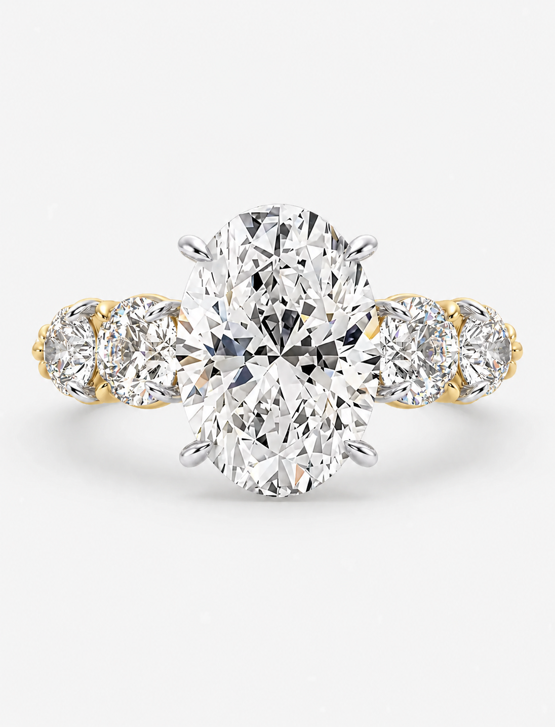 IGI Certified Lab Grown Oval Brilliant Diamond Solitaire Ring with Graduated Round Diamond Accents in Gold & Platinum