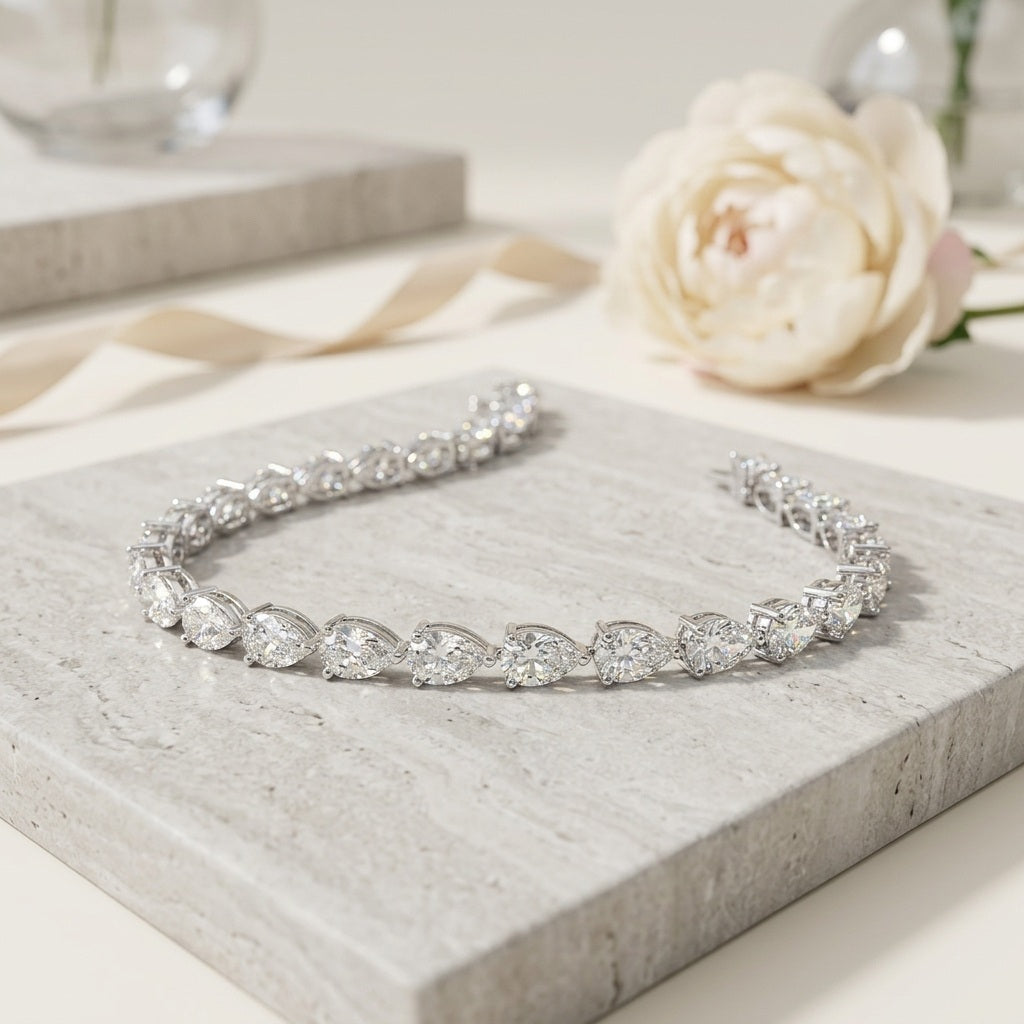 GIA Certified 8.20CT E/VS1-2 Pear Diamond Claw Set Tennis Bracelet in Platinum (950)