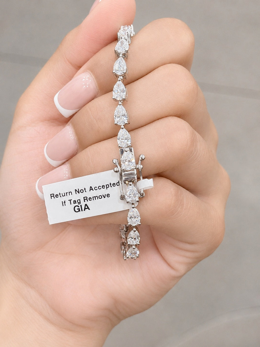 GIA Certified 8.20CT E/VS1-2 Pear Diamond Claw Set Tennis Bracelet in Platinum (950)
