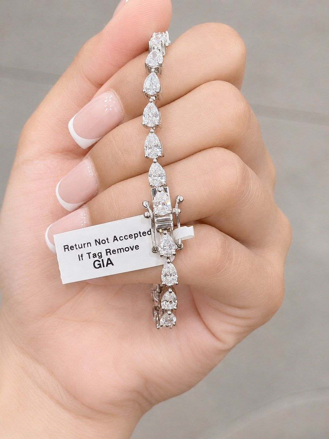 GIA Certified 8.20CT E/VS1-2 Pear Diamond Claw Set Tennis Bracelet in Platinum (950)