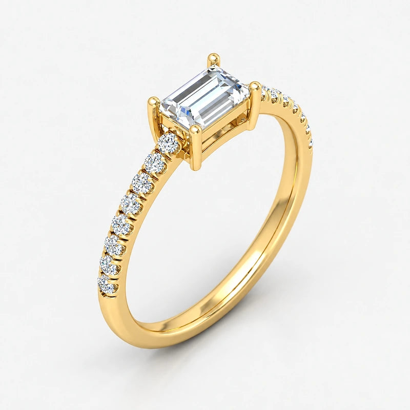 IGI Certified Lab Grown East-West Emerald Cut Diamond with Round Side Stones Claw & Pavé Engagement Ring in Gold & Platinum – 1–4Ct
