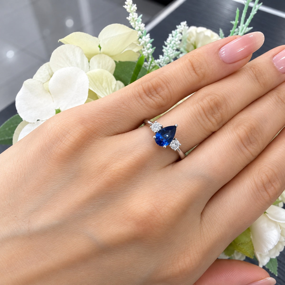 1.50Ct Blue Pear Sapphire & Side Round Diamond Three Stone Ring in 950 Platinum
