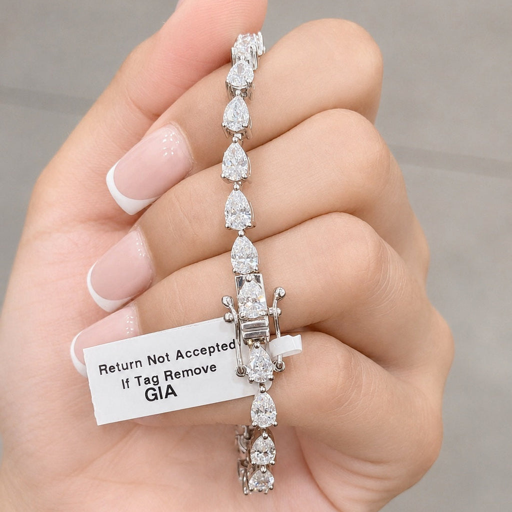 GIA Certified 8.10CT D/VS1-2 Pear Diamond Claw Set Tennis Bracelet in Platinum (950)