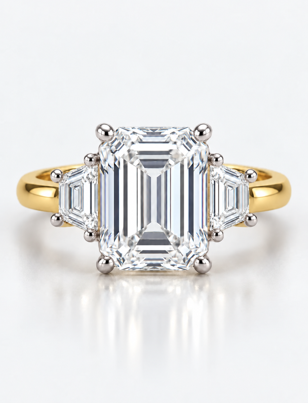 IGI Certified Lab Grown Classic Emerald-Cut Three-Stone Ring with Trapezoid Side Stones in Gold & Platinum