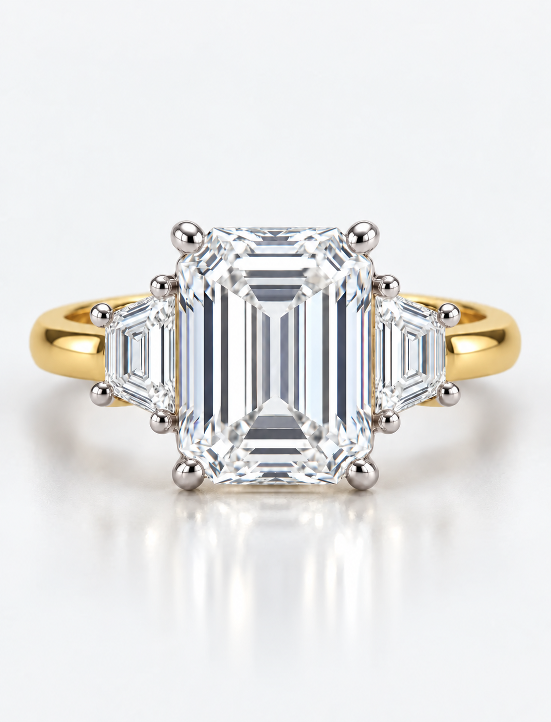 IGI Certified Lab Grown Classic Emerald-Cut Three-Stone Ring with Trapezoid Side Stones in Gold & Platinum
