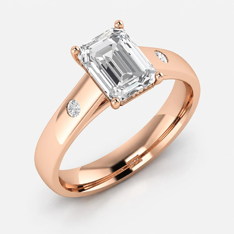 IGI Certified Lab Grown Emerald Cut Diamond with Round Side Stones Claw & Bezel Engagement Ring in Gold & Platinum – 1–4Ct