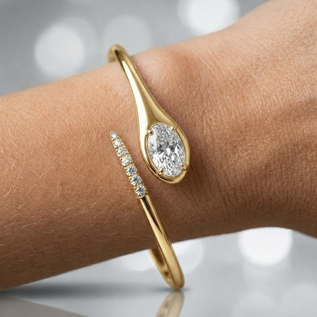 1.00ct Oval Diamond Tennis Bangle - 9k Yellow Gold