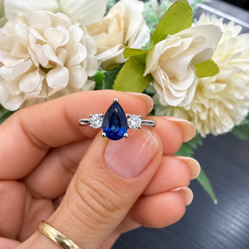 1.50Ct Blue Pear Sapphire & Side Round Diamond Three Stone Ring in 950 Platinum