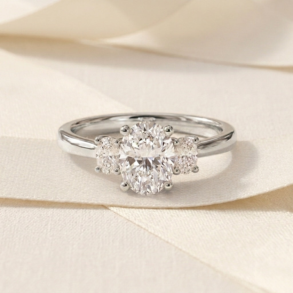 IGI Certified Oval Lab Grown Diamond Three Stone Engagement Ring - E/VS