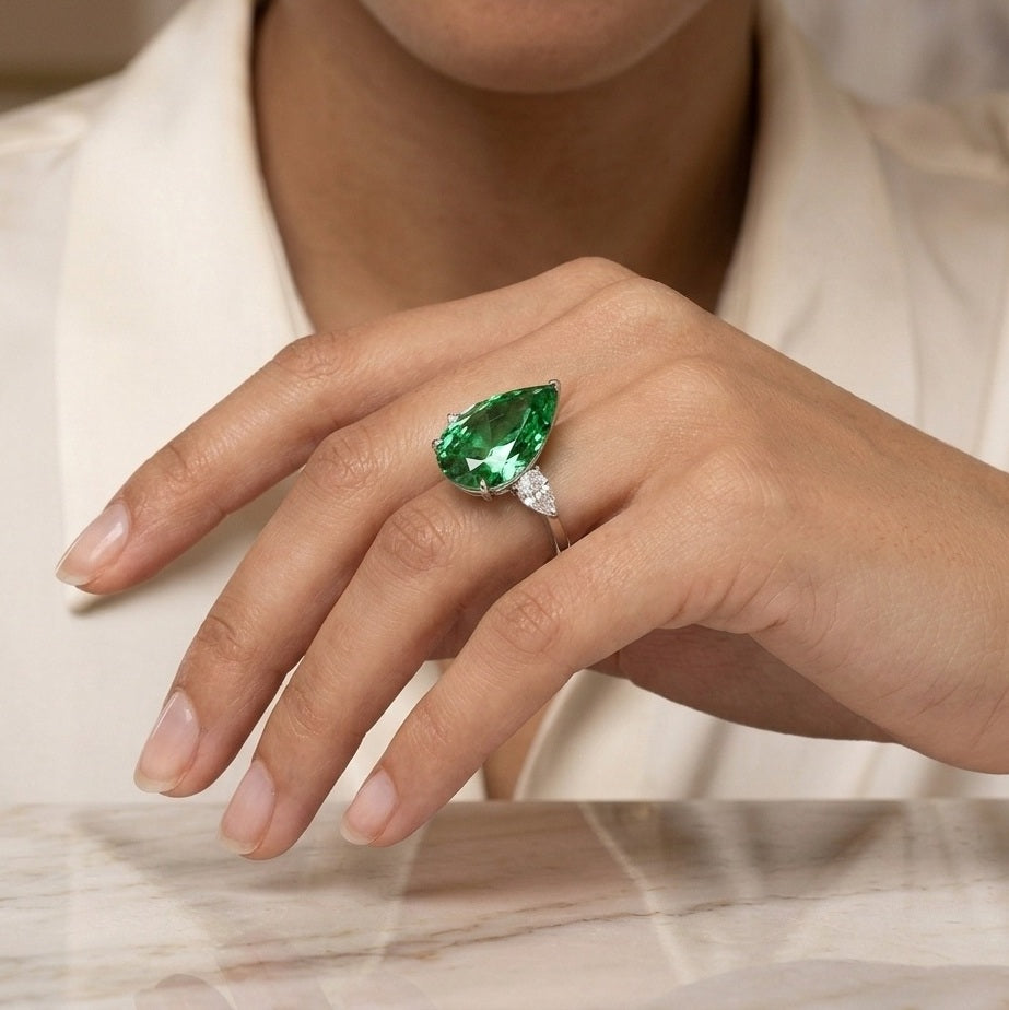 IGI Certified 12.00ct Fancy Vivid Green Pear Diamond Trilogy Ring in Platinum