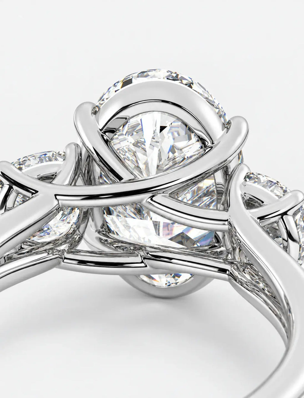 IGI Certified Lab Grown Oval Cut Diamond with Round Side Diamonds Three-Stone Engagement Ring in Gold & Platinum
