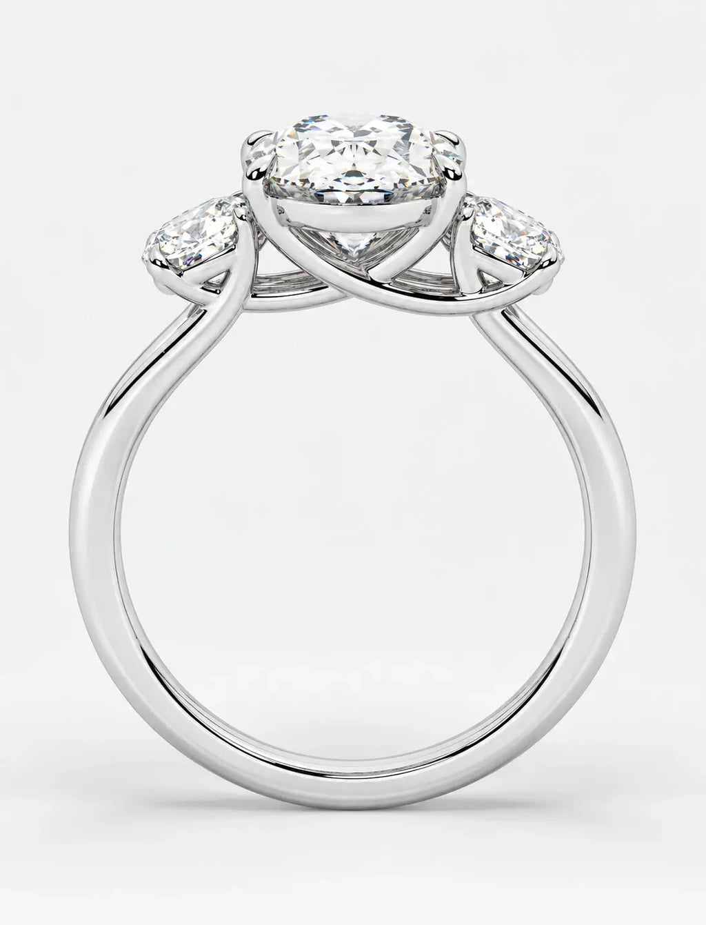 IGI Certified Lab Grown Oval Cut Diamond with Round Side Diamonds Three-Stone Engagement Ring in Gold & Platinum