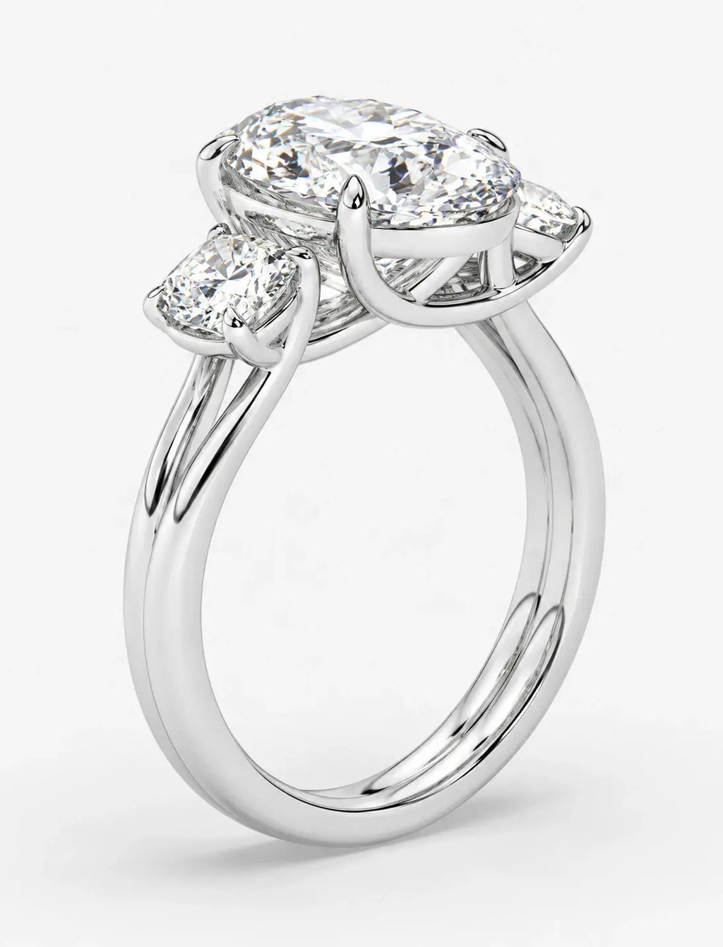 IGI Certified Lab Grown Oval Cut Diamond with Round Side Diamonds Three-Stone Engagement Ring in Gold & Platinum
