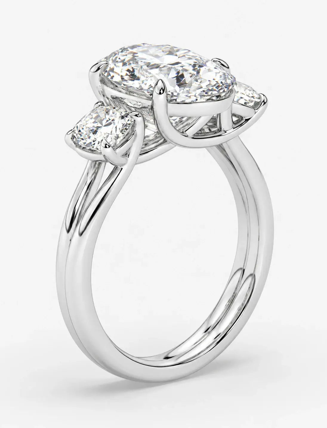 IGI Certified Lab Grown Oval Cut Diamond with Round Side Diamonds Three-Stone Engagement Ring in Gold & Platinum