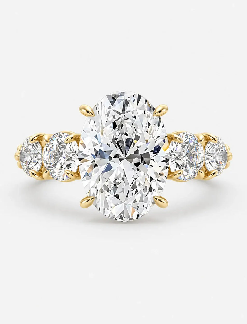IGI Certified Lab Grown Oval Brilliant Diamond Solitaire Ring with Graduated Round Diamond Accents in Gold & Platinum