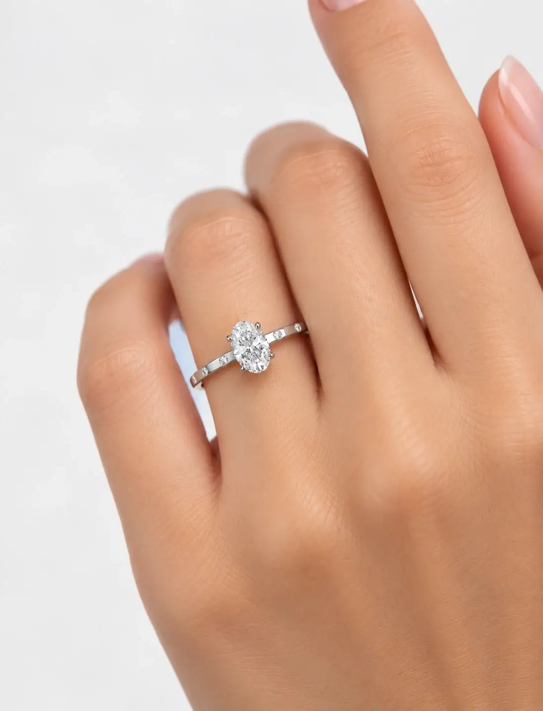 IGI Certified Lab Grown Oval Diamond Engagement Ring with Flush-Set Diamond Band in Gold & Platinum