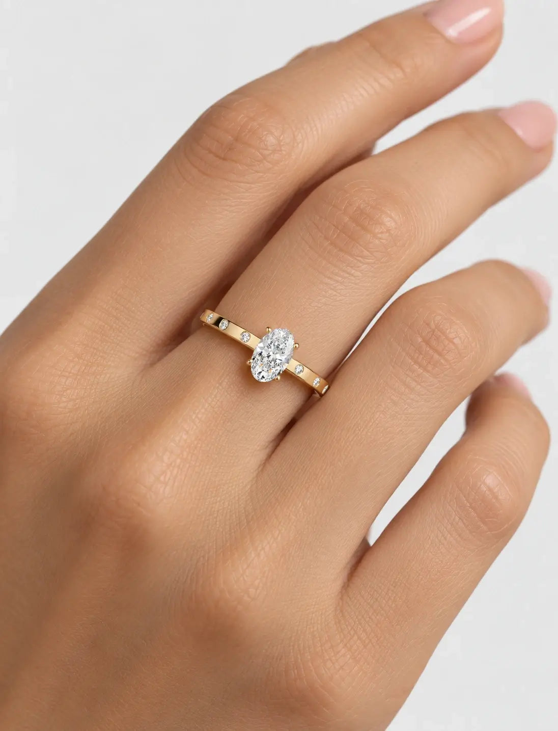 IGI Certified Lab Grown Oval Diamond Engagement Ring with Flush-Set Diamond Band in Gold & Platinum