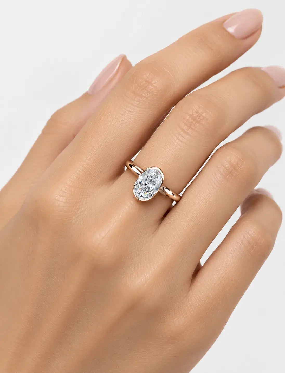 IGI Certified Lab-Grown Modern Minimalist Oval Bezel Solitaire Engagement Ring in Gold & Platinum