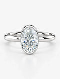 IGI Certified Lab-Grown Oval Bezel-Set Solitaire Engagement Ring in Gold & Platinum