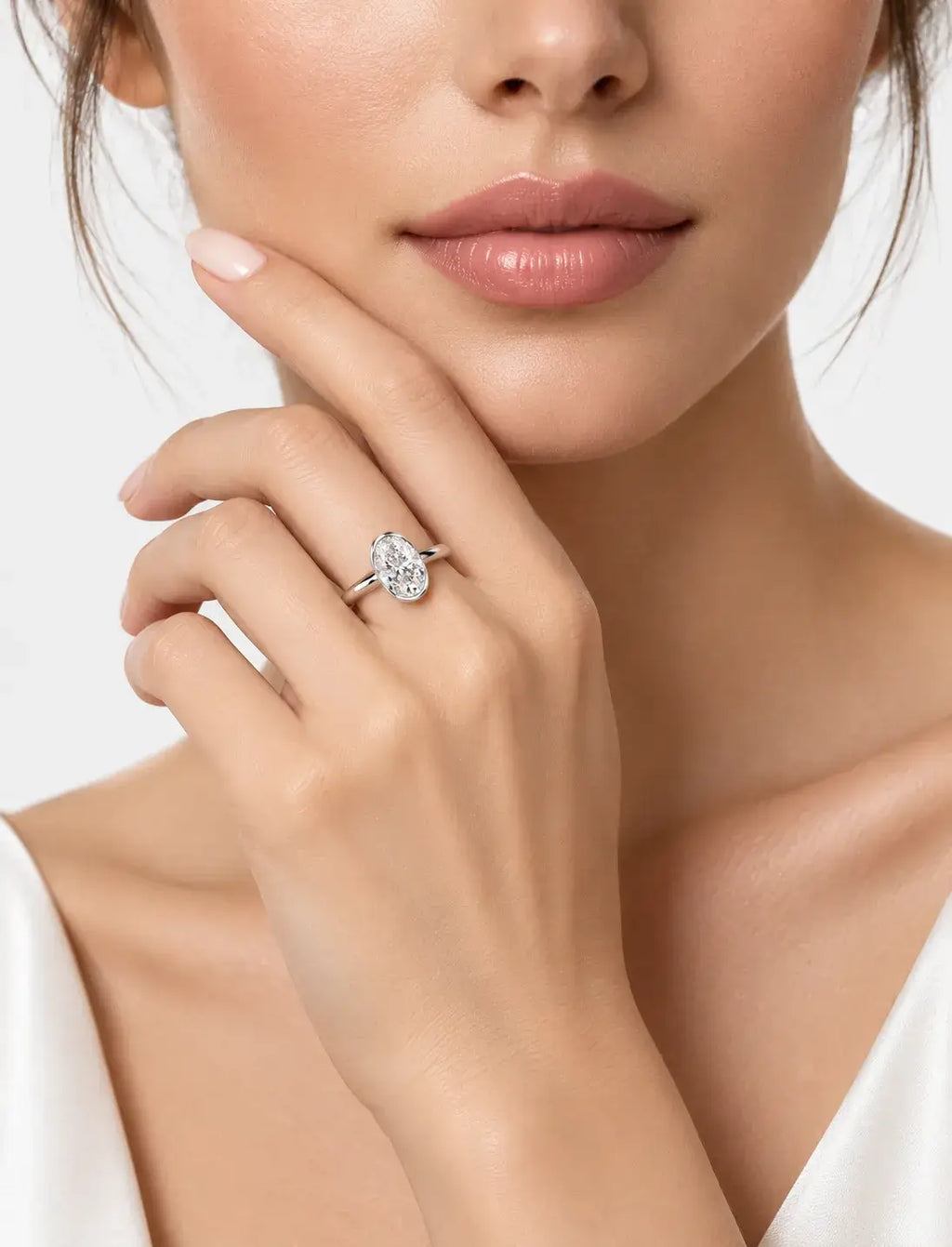 IGI Certified Lab-Grown Oval Bezel-Set Solitaire Engagement Ring in Gold & Platinum
