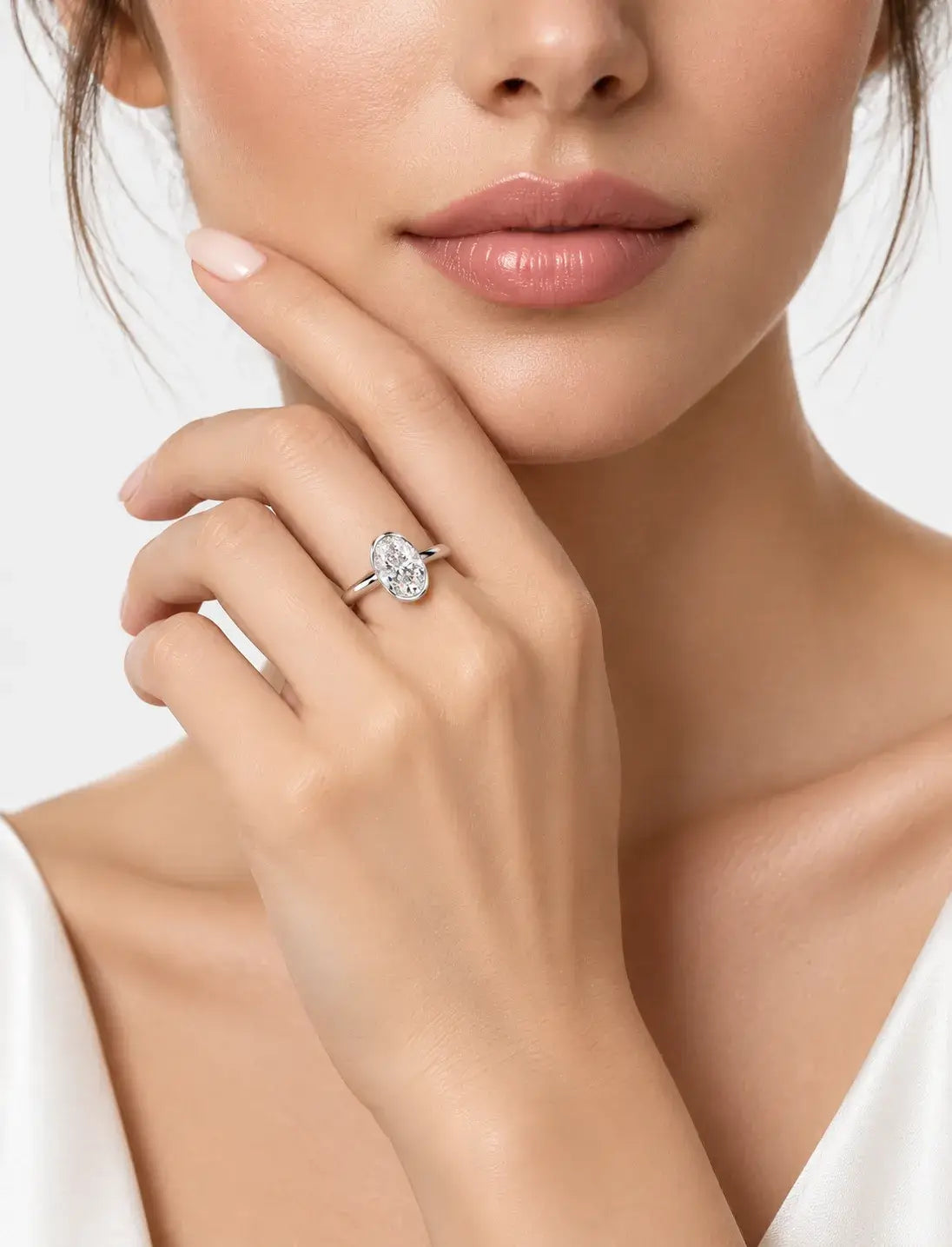 IGI Certified Lab-Grown Oval Bezel-Set Solitaire Engagement Ring in Gold & Platinum