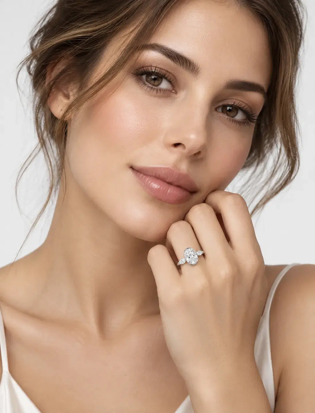 IGI Certified Lab Grown Oval Bezel Three-Stone Diamond Engagement Ring with Marquise Accents in Gold & Platinum