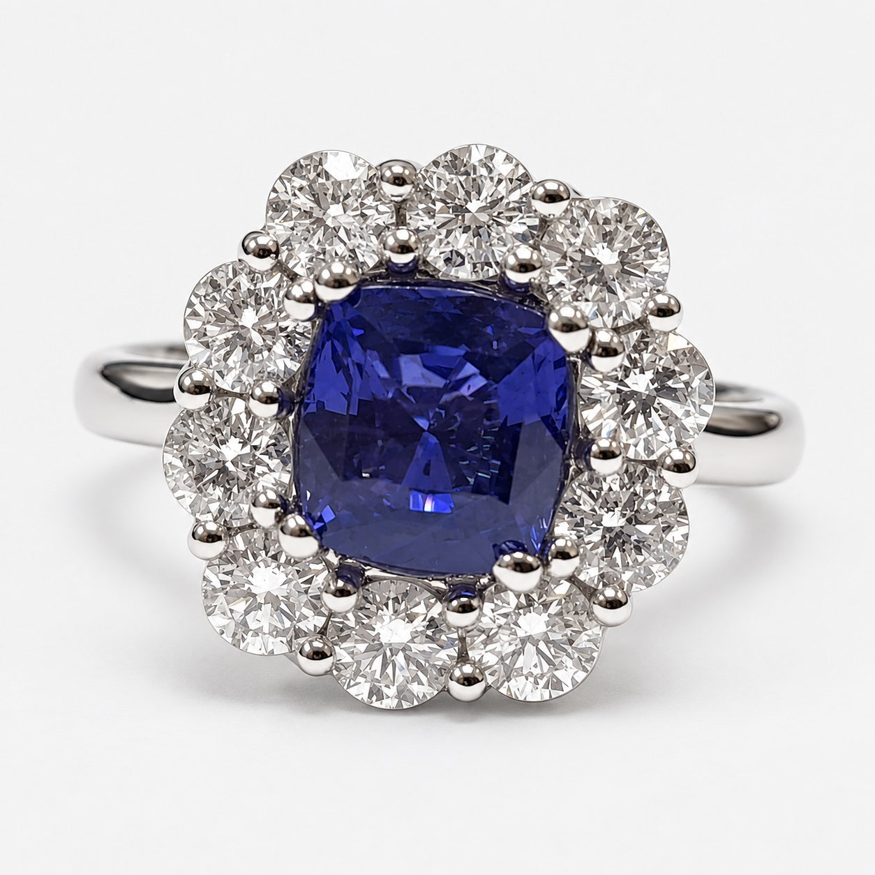 2.10ct Sapphire Cushion Cut And 1.90ct Side Diamond Cluster Ring Gold & Platinum