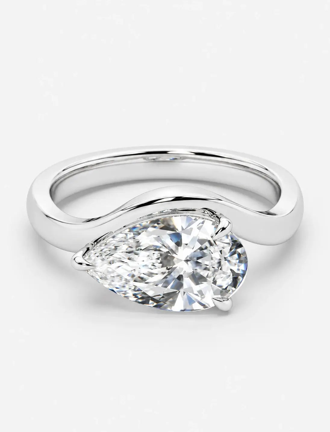 IGI Certified Lab Grown East-West Pear-Shaped Diamond Bypass Solitaire Ring in Gold & Platinum