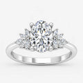 IGI Certified Aurora Oval Diamond Engagement Ring with Marquise Cluster Side Stones in Platinum & Gold