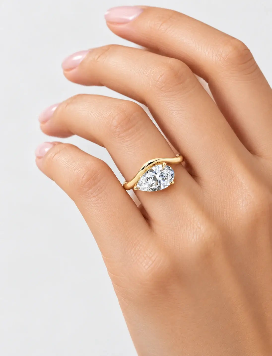 IGI Certified Lab Grown East-West Pear-Shaped Diamond Bypass Solitaire Ring in Gold & Platinum