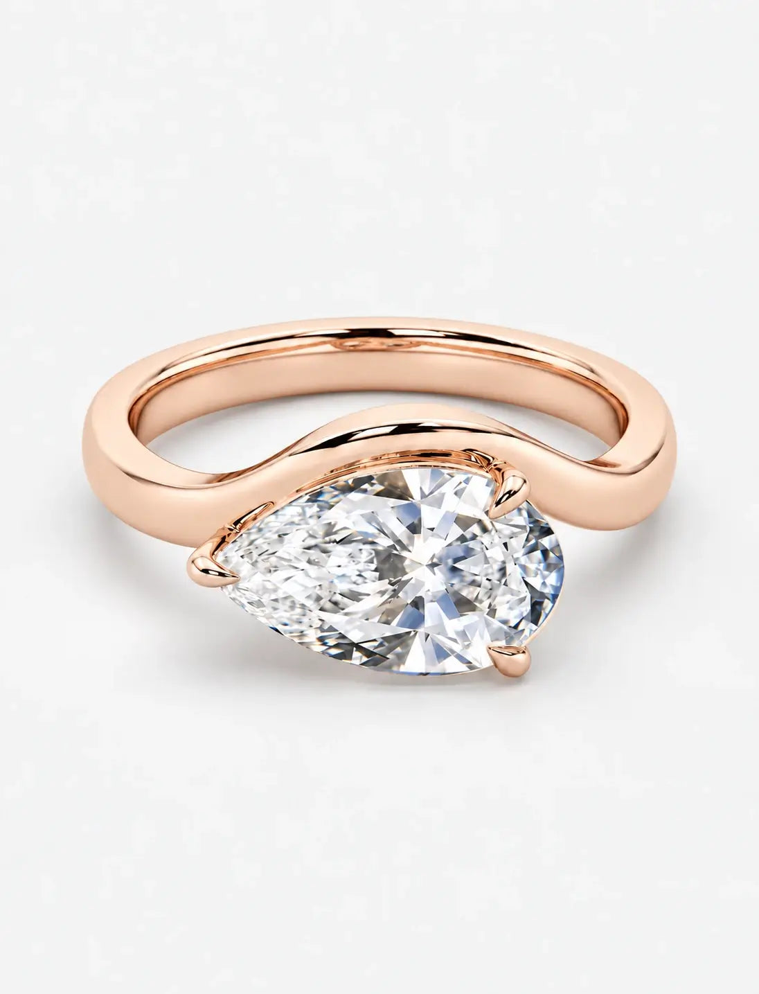 IGI Certified Lab Grown East-West Pear-Shaped Diamond Bypass Solitaire Ring in Gold & Platinum