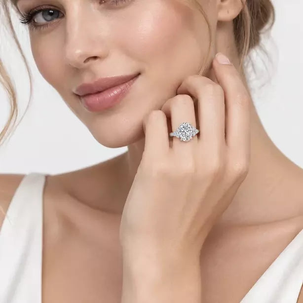 Oval-Cut Diamond Engagement Ring with Cluster Side Stones in Gold & Platinum