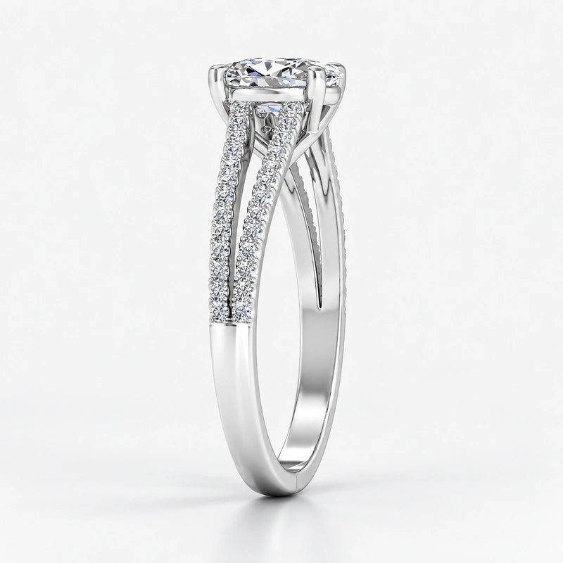 Lab-grown oval diamond engagement ring with split shank and pavé shoulders