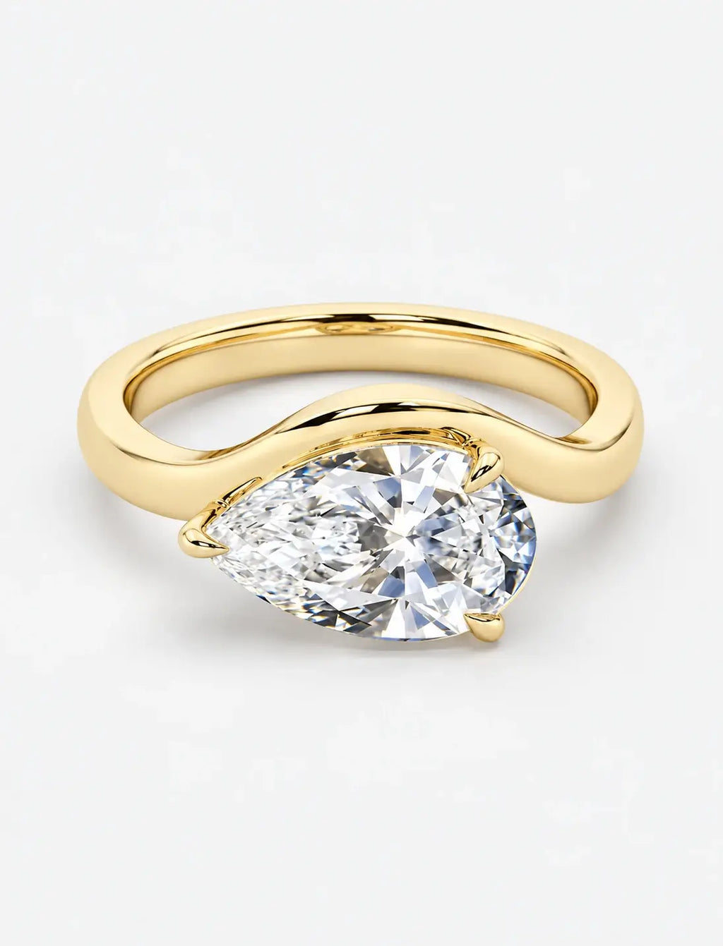 IGI Certified Lab Grown East-West Pear-Shaped Diamond Bypass Solitaire Ring in Gold & Platinum
