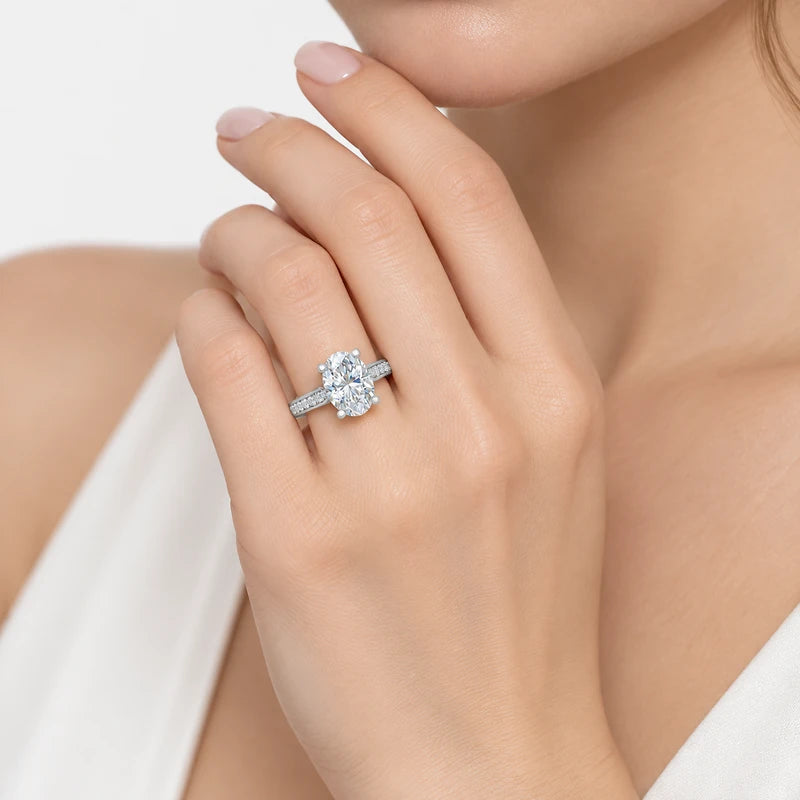 IGI Certified Oval-Cut Diamond Solitaire Engagement Ring with Pavé Band in Gold & Platinum