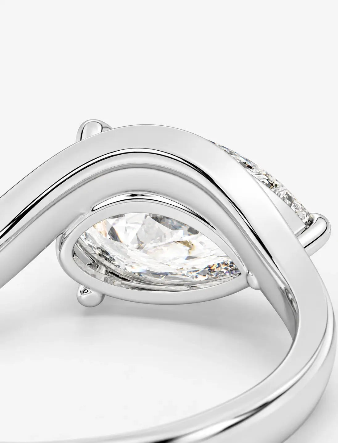 IGI Certified Lab Grown East-West Pear-Shaped Diamond Bypass Solitaire Ring in Gold & Platinum