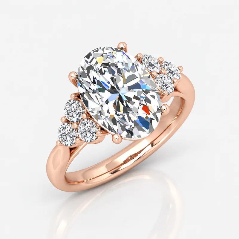 Oval-Cut Diamond Engagement Ring with Cluster Side Stones in Gold & Platinum