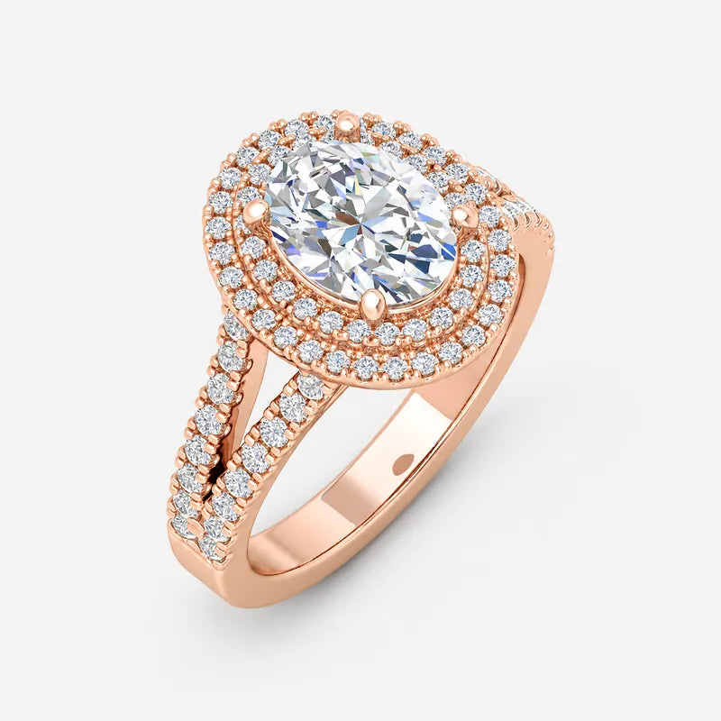 Oval-cut lab-grown diamond double halo engagement ring with pavé split shank in gold and platinum