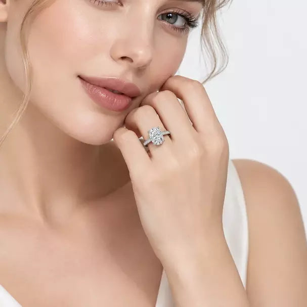 IGI Certified Oval-Cut Diamond Solitaire Engagement Ring with Pavé Band in Gold & Platinum