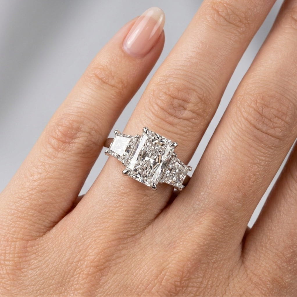 IGI Certified E/VS 6.50 Carat Radiant & Diamond Trilogy Ring Platinum