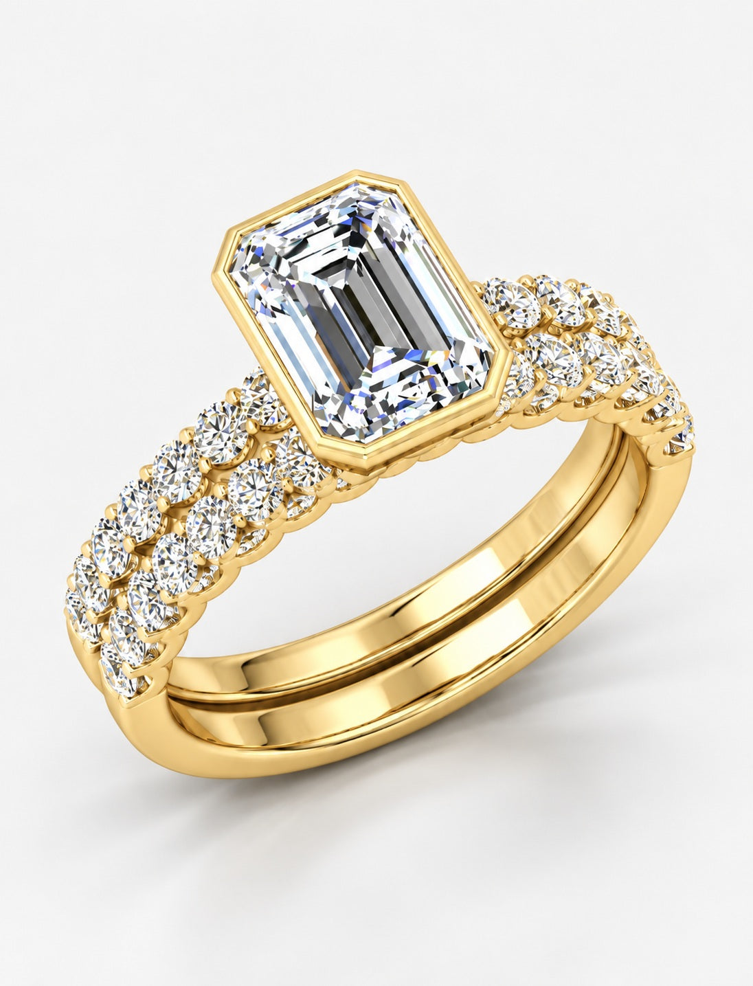 The Imperial IGI Certified Lab Grown Emerald-Cut Bezel-Set Solitaire Bridal Suite with Pavé Bands in Gold & Platinum – 1–4Ct