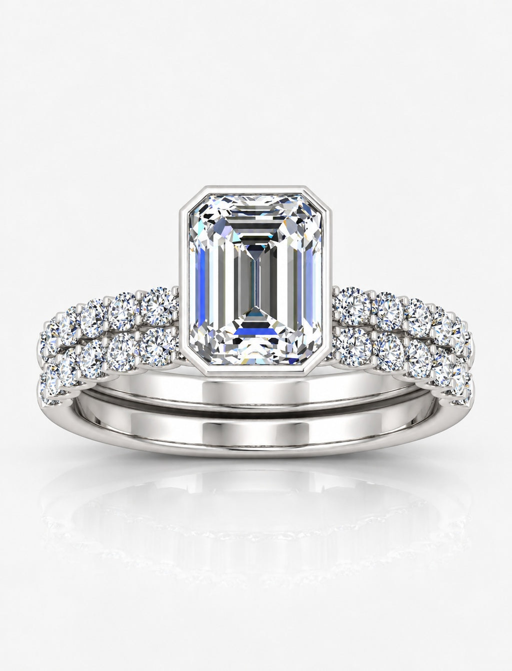 The Imperial IGI Certified Lab Grown Emerald-Cut Bezel-Set Solitaire Bridal Suite with Pavé Bands in Gold & Platinum – 1–4Ct